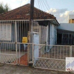 Ótima oportunidade de Investimento. Terreno com 3 casas com entradas independentes!