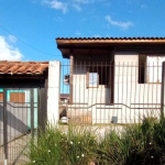 Casa com 2 quartos à venda na Rua Almiro Barcelos, 61, Stella Maris, Alvorada