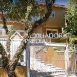 Casa com 4 quartos à venda na Rua Fernando Osório, 210, Teresópolis, Porto Alegre