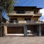 Casa com 4 quartos à venda na Rua Pinto da Rocha, 383, Partenon, Porto Alegre