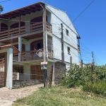 Casa com 1 quarto à venda na Rua Taveira Júnior, 471, Nonoai, Porto Alegre