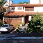 Casa em condomínio fechado com 4 quartos à venda na Rua Fernando Osório, 90, Teresópolis, Porto Alegre