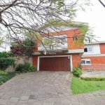 Casa com 5 quartos à venda na Rua Felipe Becker, 178, Três Figueiras, Porto Alegre