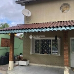 Casa com 3 quartos à venda na Avenida Ararangua, 151, Guarujá, Porto Alegre