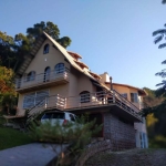 Casa em condomínio fechado com 5 quartos à venda na Rua Gécio de Souza e Silva, 65, Sambaqui, Florianópolis