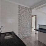 Casa com 2 dormitórios à venda, 61 m² por R$ 320.000,00 - Vila Caiçara - Praia Grande/SP