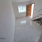 Sobrado com 3 dormitórios à venda, 104 m² por R$ 595.000,00 - Tude Bastos (Sítio do Campo) - Praia Grande/SP