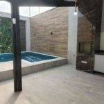 Casa com 2 dormitórios à venda, 110 m² por R$ 980.000,00 - Maracanã - Praia Grande/SP