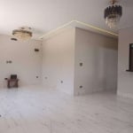 Casa com 4 dormitórios à venda, 127 m² por R$ 1.650.000 - Caiçara - Praia Grande/SP