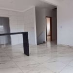 Casa com 2 dormitórios à venda, 70 m² por R$ 550.000 - Tude Bastos (Sítio do Campo) - Praia Grande/SP