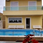 Casa com 4 dormitórios à venda, 232 m² por R$ 1.300.000,00 - Balneário Flórida - Praia Grande/SP