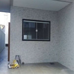 Sobrado com 3 dormitórios à venda, 125 m² por R$ 720.000,00 - Cidade Ocian - Praia Grande/SP