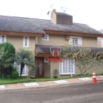 Casa à venda no condomínio Vale das Araucárias em Londrina. Sobrado com 4 quartos sendo 2 suítes, sala, lavabo, copa, cozinha, área de serviço, 3 banh