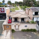 Casa Otima Localização na BR, duas entradas, com Galpão