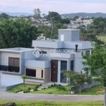 Casa em condomínio fechado com 4 quartos à venda na Rua Leonel Pereira, 2033, Cachoeira do Bom Jesus, Florianópolis