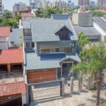 Casa 4 dormitórios à venda no Bairro Chácara das Pedras com 304 m² de área privativa - 2 vagas de garagem