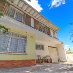 Casa com 5 quartos à venda na Rua João Bastian, 24, Três Figueiras, Porto Alegre