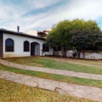 Casa com 4 quartos à venda na Avenida Guarujá, 136, Guarujá, Porto Alegre