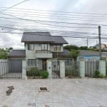 Sobrado com 5 dormitórios à venda, 328 m² por R$ 980.000 - Capão Raso - Curitiba/PR