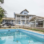 Casa com 4 quartos à venda na Rua Marquês do Maricá, 444, Vila Nova, Porto Alegre