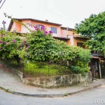 Casa com 5 quartos à venda na Rua Ângelo Passuelo, 79, Vila Nova, Porto Alegre