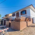 Casa com 3 quartos à venda na Avenida Delmar Rocha Barbosa, 792, Parque Santa Fé, Porto Alegre