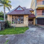 Casa em condomínio fechado com 3 quartos à venda na Avenida Vicente Monteggia, 1010, Cavalhada, Porto Alegre