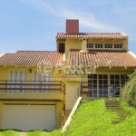 Casa com 3 quartos à venda na Rua Padre João Batista Reus, 2071, Camaquã, Porto Alegre