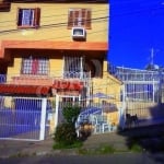 Casa com 3 quartos à venda na Rua Professor Joaquim Louzada, 104, Camaquã, Porto Alegre