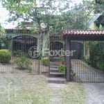 Casa com 4 quartos à venda na Rua Comandai, 560, Cristal, Porto Alegre