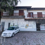 Casa com 4 quartos à venda na Avenida Eduardo Prado, 1511, Cavalhada, Porto Alegre