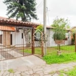 Casa com 4 quartos à venda na Avenida Guarujá, 199, Guarujá, Porto Alegre