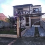 Casa com 3 quartos à venda na Rua Condores, 565, Jardim Algarve, Alvorada