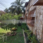 Casa com 3 quartos à venda na Rua Ibirubá, 160, Cavalhada, Porto Alegre