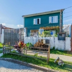 Casa com 4 quartos à venda na Rua Três mil setecentos e setenta e dois, 542, Lomba do Pinheiro, Porto Alegre