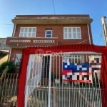 Casa com 4 quartos à venda na Rua Buarque de Macedo, 424, São Geraldo, Porto Alegre