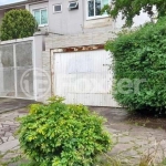 Casa com 3 quartos à venda na Rua Mura, 145, Guarujá, Porto Alegre