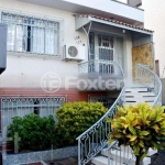 Casa com 5 quartos à venda na Rua Umbú, 124, Passo da Areia, Porto Alegre