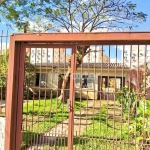 Casa com 5 quartos à venda na Rua Nove de Junho, 176, Vila São José, Porto Alegre