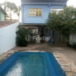 Casa com 4 quartos à venda na Rua Conde da Figueira, 711, Vila Jardim, Porto Alegre