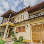 Casa com 5 quartos à venda na Avenida José Corrêa da Silva, 117, Cavalhada, Porto Alegre