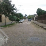 Casa com 4 quartos à venda na Rua Jacundá, 638, Guarujá, Porto Alegre