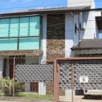 Casa com 3 quartos à venda na Rua Dona Firmina, 143, Vila São José, Porto Alegre