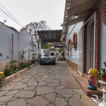 Casa com 3 quartos à venda na Rua Bernardo Guimarães, 148, Partenon, Porto Alegre