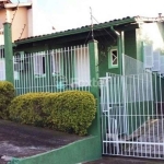 Casa com 3 quartos à venda na Rua Flor de Pessegueiro, 57, Vila Nova, Porto Alegre