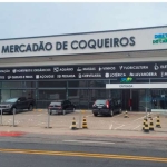 Aluga-se loja térrea com 400 metros  na avenida principal em Coqueiros