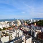 Apartamento semimobiliado com 3 quartos sendo 1 suíte, 2 vagas de garagem no bairro Coqueiros em Florianópolis/SC.