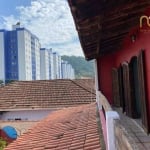 Sobrado com 4 dormitórios à venda, 175 m² por R$ 890.000,00 - Canto do Forte - Praia Grande/SP