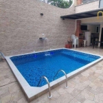 Casa com 3 dormitórios à venda, 120 m² por R$ 1.200.000,00 - Caiçara - Praia Grande/SP