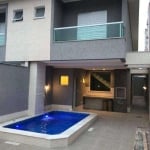 Sobrado com 3 dormitórios à venda, 151 m² por R$ 1.160.000 - Tupi - Praia Grande/SP